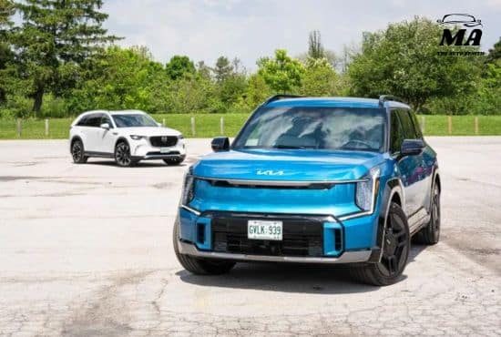 white mazda cx-90, blue kia ev9